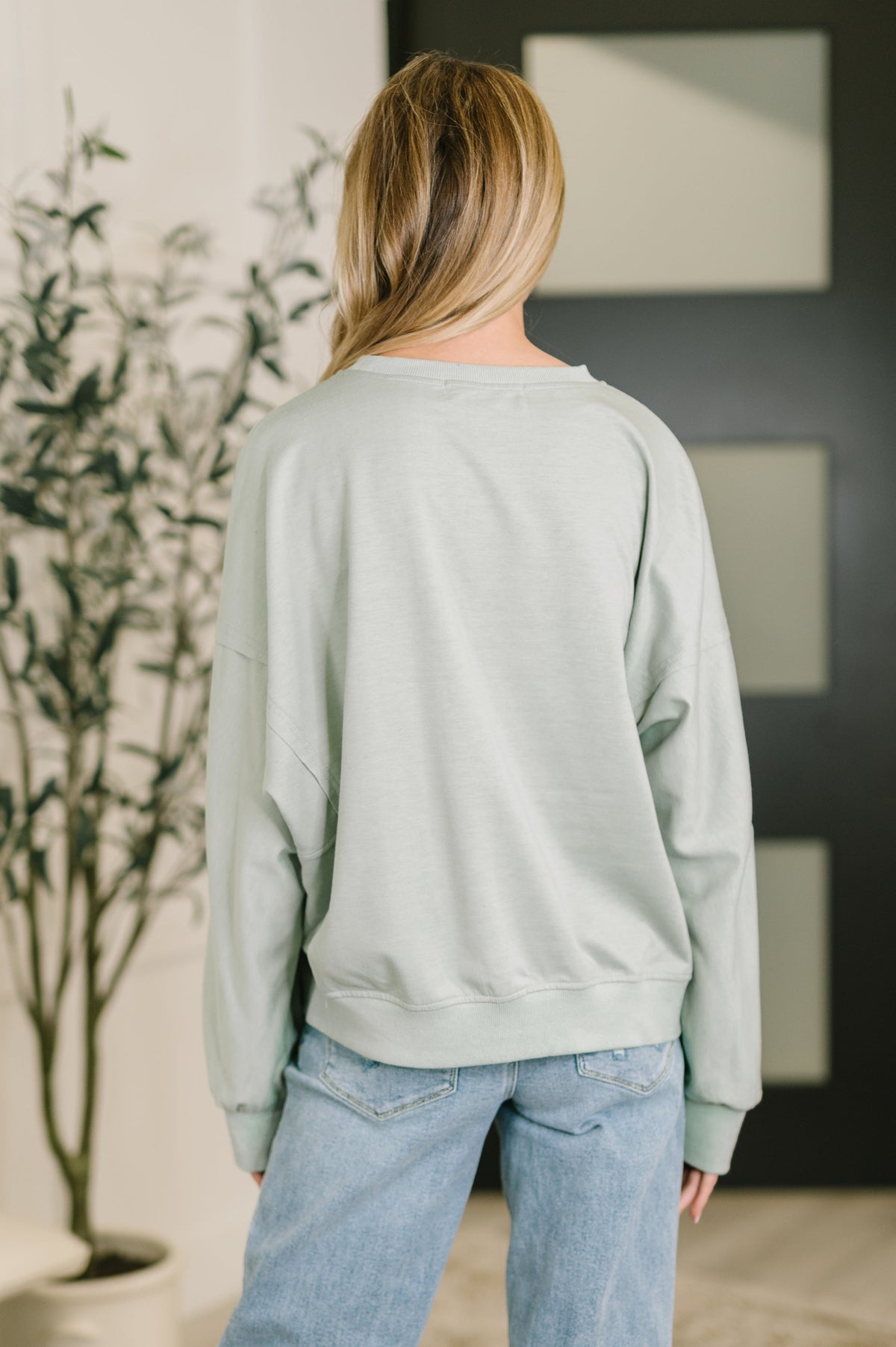 Petal Poise Floral Applique Pullover in Ivy